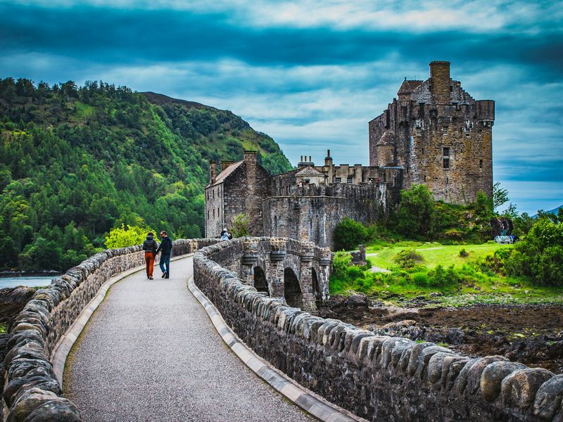 Crossing the bridge to Eilean Donan Castle which is located on Kyle Of Lochalsh which overlooks the Isle of Skye.  .jpg